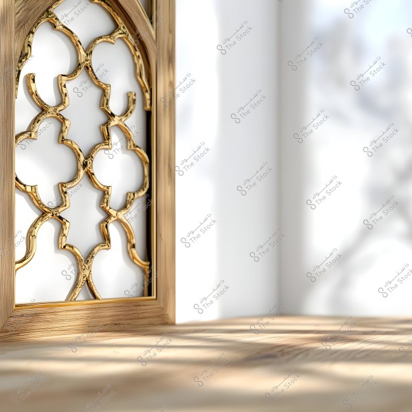 A window with a traditional Arabic design featuring ornate golden patterns against a white background. The lighting highlights the intricate details, casting artistic shadows on the nearby wall.