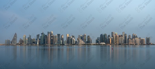 A snapshot of the towers and skyscrapers overlooking the Arabian Gulf in the Qatar region, Doha tourist attractions, tourism in Qatar, Qatar Towers, a tourist waterfront in the State of Qatar.