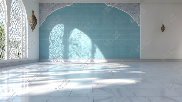 An empty interior room with Islamic architectural design. The walls are decorated with light blue tiles featuring a white decorative arch detail. The arched windows with ornate metal grilles allow sunlight to cast intricate shadows on the glossy white marble floor. The room contains hanging lamps adorned with traditional Arabic patterns.
