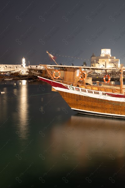 A shot of a group of empty boats anchored in the Qatar Sea, landscapes, ships and fishing boats.