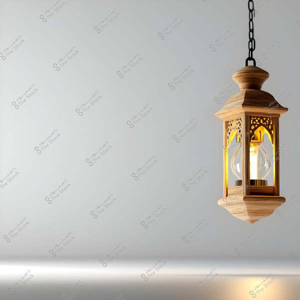 A decorative wooden lantern hanging from the ceiling is featured in the foreground of the image with warm lighting emanating from within. The lantern\'s design includes intricate carvings and appears to be inspired by traditional Arabic style. The background is simple with a subtle gradient that highlights the shape of the lantern.