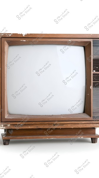 Image of an old television set with a wooden design, featuring a large screen with no visible display. The television has a wooden frame with peeling marks on the corners, and vent slots are present on the right side. The television rests on a short wooden base.