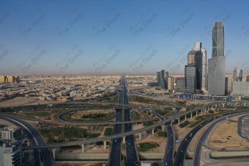 An aerial photo of the capital, Riyadh, and it shows the sky is almost clear during the day, the towers in the city of Riyadh