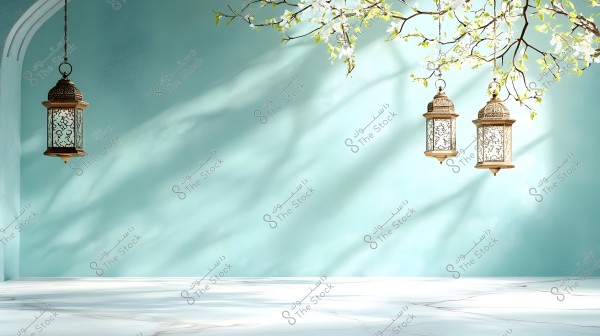 Three ornate copper lanterns hanging from a tree branch covered with white blossoms, set against a light blue wall and a curved ceiling. Sunlight and shadows play on the white marble surface below.