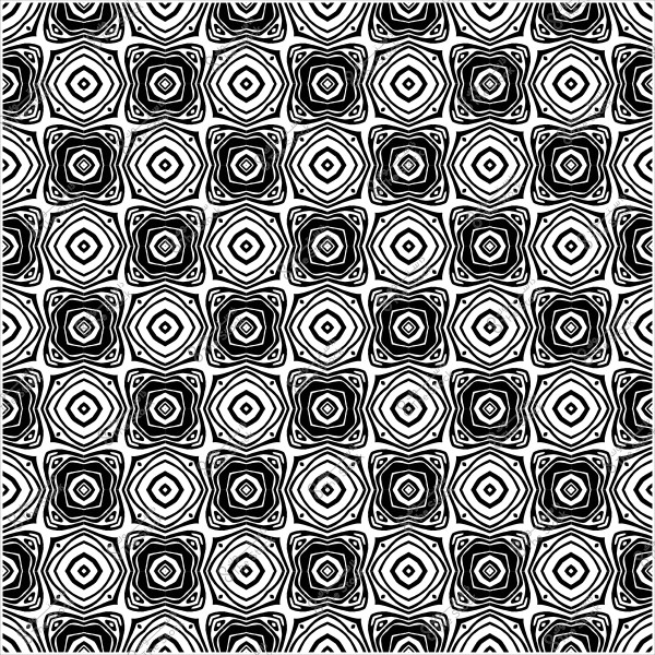 نمط هندسي متماثل يحتوي على تصميمات معقدة باللونين الأبيض والأسود.