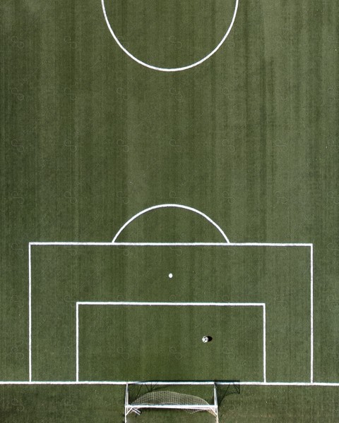 Overhead shot of a turf soccer field, green grass, stadium layout, soccer sport, sports complex.