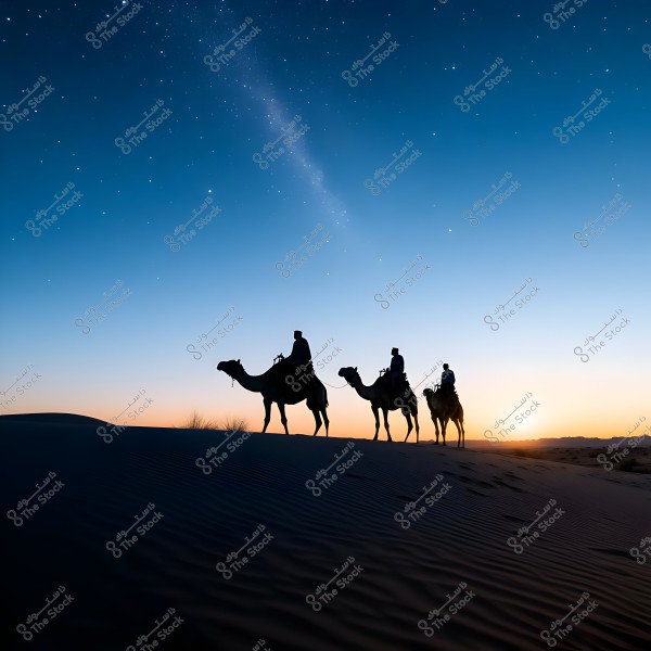 An image of three camels walking in a line on sand dunes during sunset. The people atop the camels appear as silhouettes against the twilight sky, dotted with stars. The sand dunes are dark in the foreground, with the horizon brightened by the setting sun.
