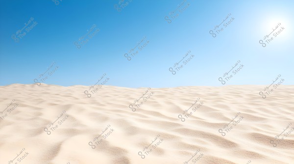 View of an expansive desert, featuring white sand and gentle sand waves under a clear blue sky, with the sun shining in the upper corner of the image.