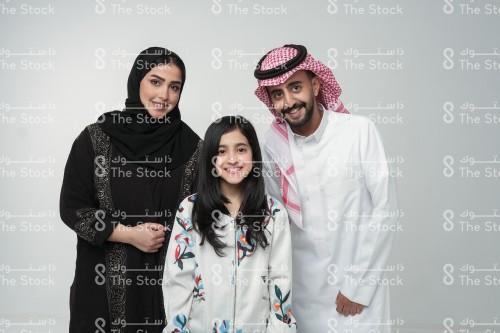 Saudi family making gestures