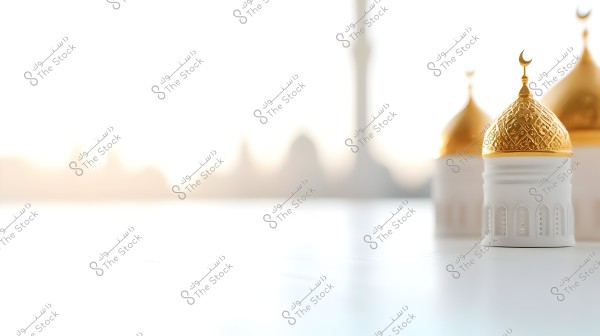 An image depicting a golden dome of a mosque with intricate Islamic designs and a crescent on top. In the background are blurred outlines of a minaret and other buildings in bright daylight.