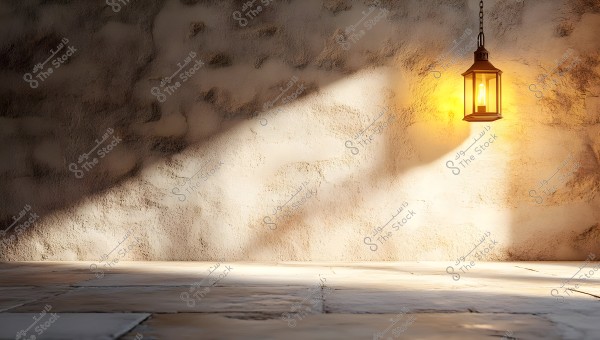 A hanging lantern illuminated with a warm glow casts elegant shadows on a textured stone wall and floor. The aesthetic design creates a traditional and serene atmosphere.