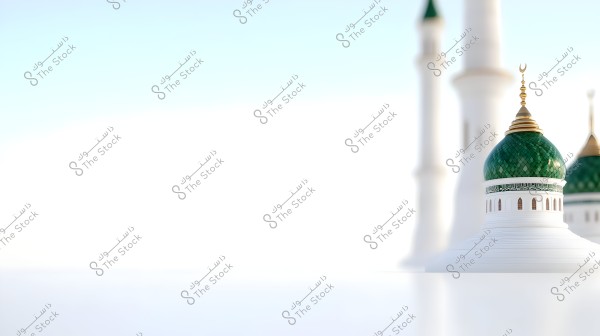 An image showing a green dome topped with a golden crescent on a large mosque, with two prominent white minarets in the background under a light blue sky. The dome is adorned with geometric patterns on its surface.
