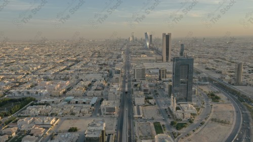 An aerial view of the capital, Riyadh, showing cloudy sky during the day, the towers in the city of Riyadh