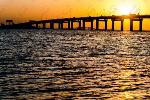 Aesthetic picture of Al-Khobar waterfront during sunset, calm seascapes, marine nature.