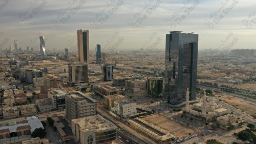 An aerial view of the capital, Riyadh, showing cloudy sky during the day, the towers in the city of Riyadh