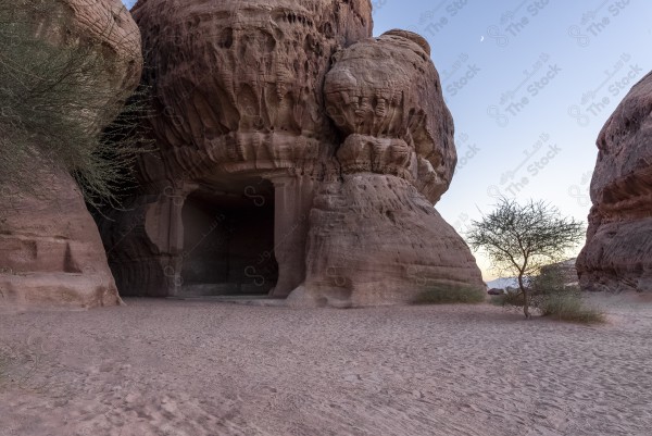 An aerial shot of the historic old buildings of Mada'in Saleh in Al-Ula Governorate, Saudi Arabia, tourist places in Saudi Arabia, NEOM.