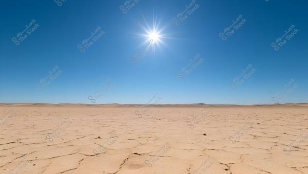 An image of a vast desert landscape stretching to the horizon under a clear blue sky with a bright sun in the middle. The ground appears dry and cracked, indicating aridity and hot weather.