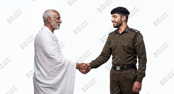 An image of two men shaking hands. The man on the left is wearing a white wrap, suggesting he might be a pilgrim. The man on the right is dressed in a brown military uniform with a black beret, indicating he is a police officer. The background is completely white.