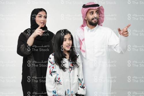 Saudi family making gestures