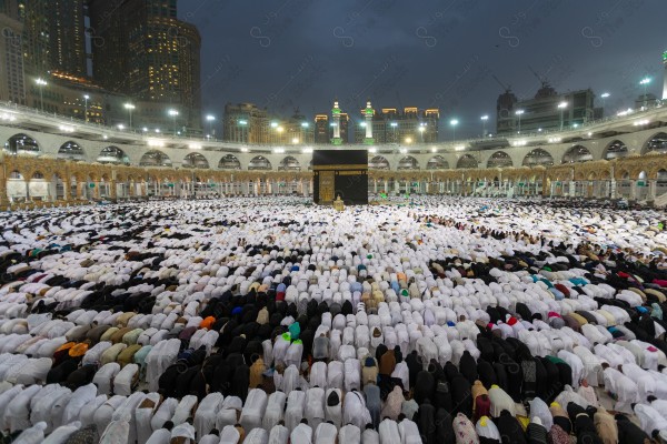 A snapshot of visitors to Baitullah Al-Haram during prayer at the Kaaba, pilgrims and Umrah performers, Hajj and Umrah, Grand Mosque.