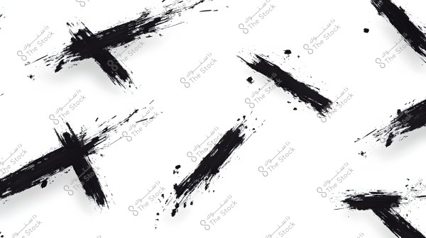 An image with a white background featuring several black brush strokes arranged randomly. The strokes are made with a wide brush and appear scattered across different parts of the image in an artistic scribble pattern.