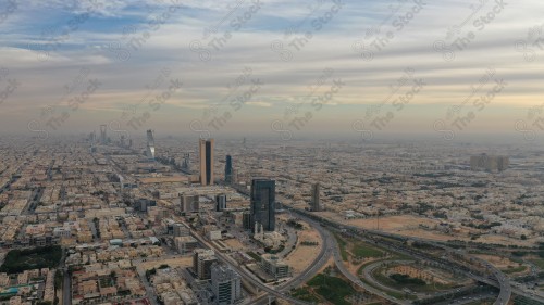 An aerial view of the capital, Riyadh, showing cloudy sky during the day, the towers in the city of Riyadh