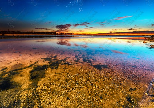 Aesthetic picture of Al-Khobar waterfront during sunset, calm seascapes, Al-Khobar, Saudi Arabia, marine nature.