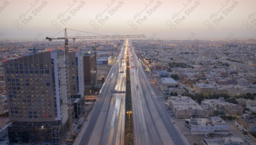 An aerial photo of the capital, Riyadh, and it shows the sky is almost clear during the day, the towers in the city of Riyadh