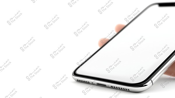 An image showing a hand holding a silver smartphone with a sleek design and curved edges. The screen is clear and glossy with a white background, displaying the bottom speaker holes and charging port on the lower side of the device.