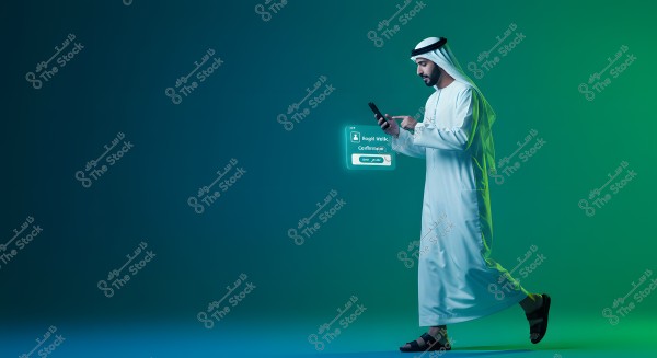 An image of a man wearing a white thobe and traditional head covering, holding a smartphone in his hand, walking against a blue and green background. Next to him is a digital interface with text and options. The scene suggests the use of modern technology in daily life and possibly represents the Arabian Gulf region.