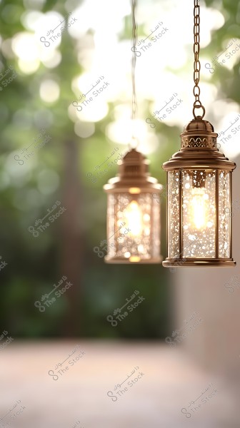 Two hanging metal lanterns, intricately designed with floral patterns, illuminated with warm lights against a blurred background of natural greenery, evoking a sense of tranquility and traditional charm.