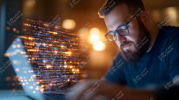 An image of a man wearing glasses and working on a laptop, with reflections of numbers and data on the screen. The scene is illuminated with warm lighting and focus, suggesting work in programming or technology.