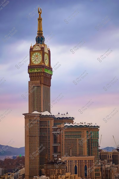 Image of the Clock Tower in Mecca with a cloudy sky in the background.