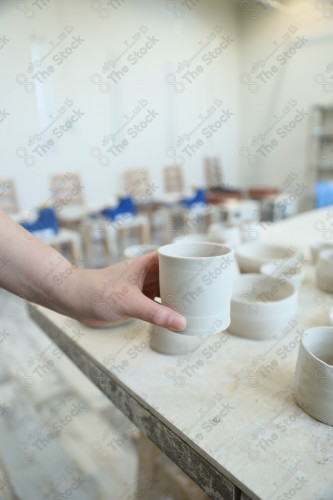 A group of pottery made by hand in the pottery workshop, pottery making