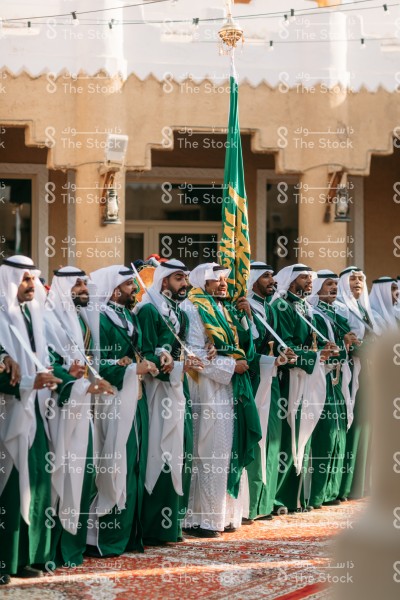 A group of Saudi men wearing the Saudi costumes for the najdi traditional dance