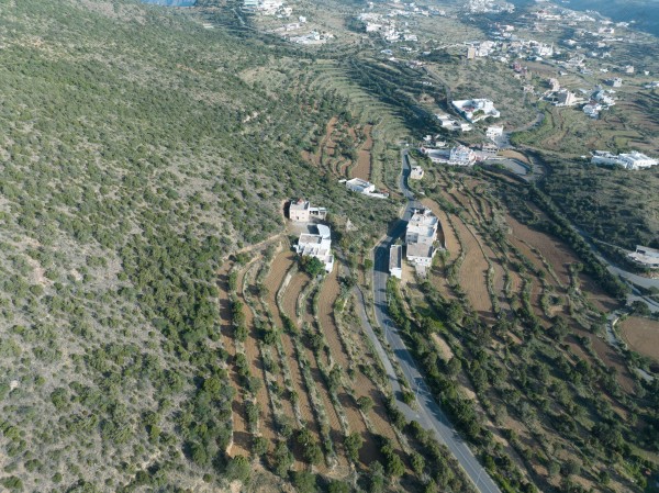 A shot of a series of mountains and green areas in the city of Abha in southern Saudi Arabia, houses on mountain heights, nature in Saudi Arabia