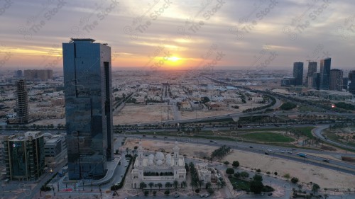 An aerial view of the capital, Riyadh, showing cloudy sky during the day, the towers in the city of Riyadh