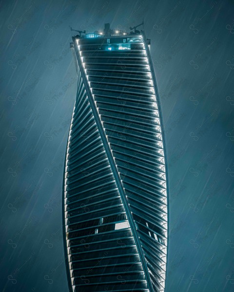 A close-up of the Majdoul Tower, one of the buildings and landmarks of the city of Riyadh during the rain at night, the skyscrapers of Sahib, Riyadh at night.