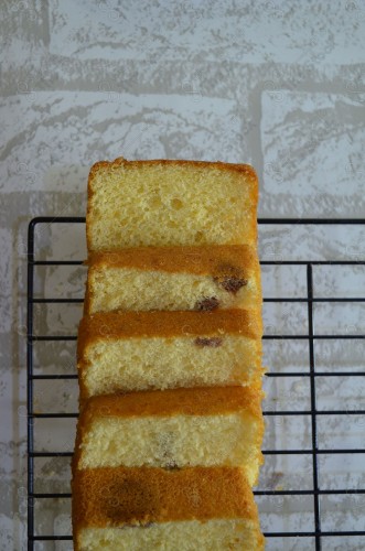 A shot of a group of lemon cake slices on a white background, bakery and pastry.