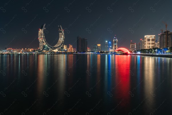 A snapshot of the towers and skyscrapers overlooking the Arabian Gulf in the Qatar region, Doha tourist attractions, tourism in Qatar, Qatar Towers, a tourist waterfront in the State of Qatar.