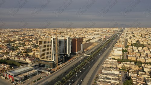 An aerial view of the capital, Riyadh, showing cloudy sky during the day, the towers in the city of Riyadh