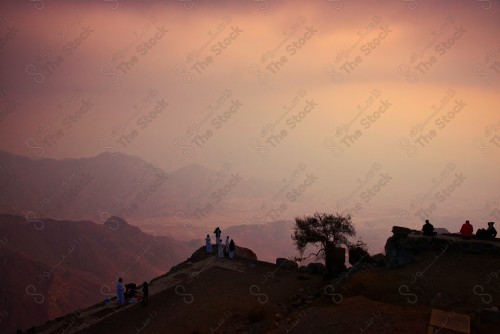 A shot of the rocky mountains in the city of Taif, and the sky appears cloudy in western Saudi Arabia, a series of rocky mountains.