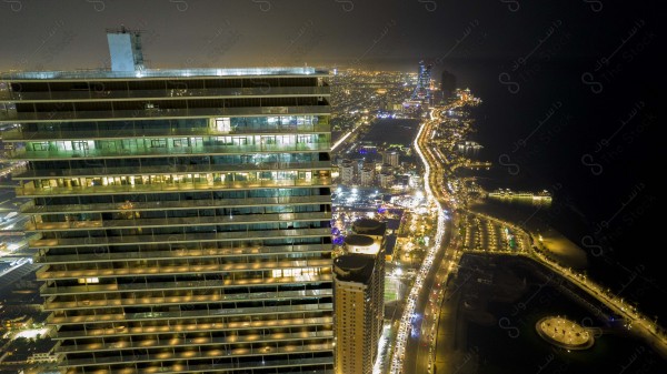 An aerial shot of the waterfront, one of the landmarks of the city of Jeddah, showing the city's buildings and landmarks, skyscrapers, the Red Sea