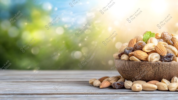 An image of a wooden bowl filled with assorted nuts, including almonds, cashews, and raisins. The background of the image is blurred with green, blue, and white hues, suggesting a bright, natural outdoor setting.