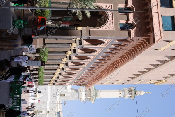 Mecca, Saudi Arabia - March 12 2025: people buying products from market shop in Mecca close to Masjid al-Haram, pilgrims umrah shopping in Makkah