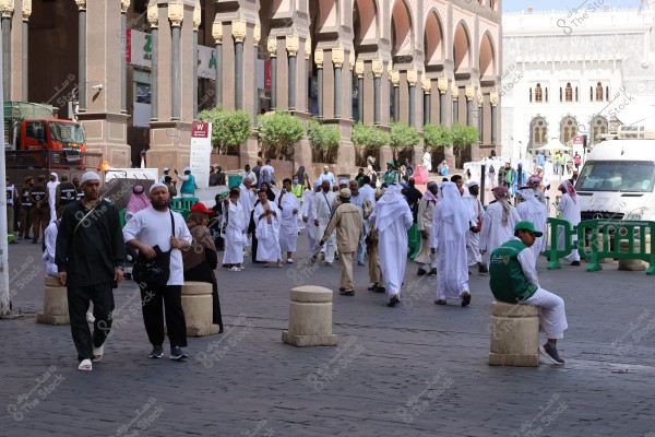 Mecca, Saudi Arabia - March 12 2025: people buying products from market shop in Mecca close to Masjid al-Haram, pilgrims umrah shopping in Makkah