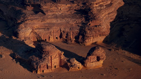 An aerial shot of the historic old buildings of Mada'in Saleh in Al-Ula Governorate, Saudi Arabia, tourist places in Saudi Arabia, NEOM.