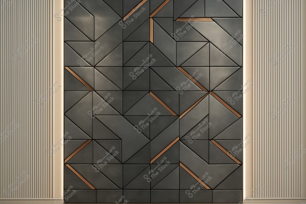 Modern wall design featuring tiles with geometric shapes. The tiles are dark with prominent copper metallic lines, and vertical white lines on the sides. The arrangement creates a repetitive pattern with triangular and square shapes.