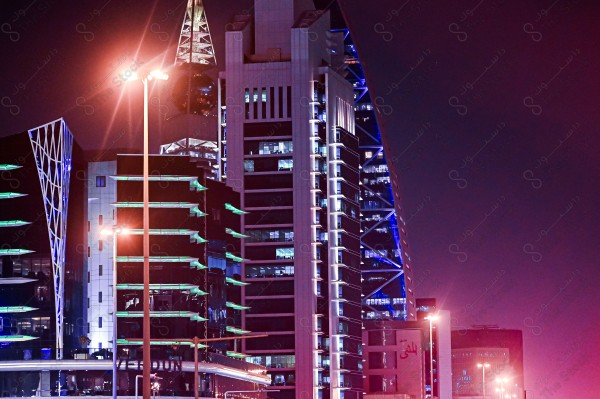 A snapshot showing one of the buildings and landmarks of the city of Riyadh at night and the sky appears clear, skyscrapers, buildings and landmarks, architecture and planning