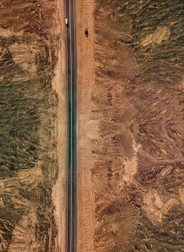 Top view of road that cuts through a series of rocky mountains, nature in Saudi Arabia